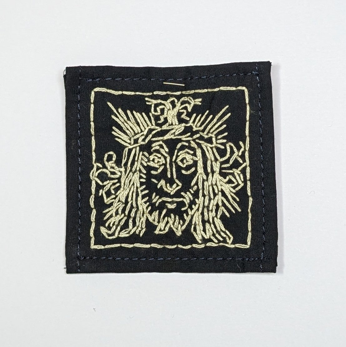 Head of Crist Hand Embroidered Patch